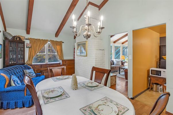 Chandelier, Dining room, Interior, Living room, Stone Walls, Wooden Beams, Wood Texture Flooring