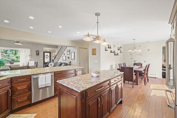 Chandelier, Dining room, Interior, Kitchen, Pendant Lights, Recessed Lighting, Stainless Steel Appliances, Wood Texture Flooring