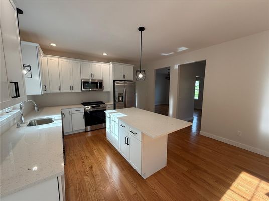 Interior, Kitchen, Pendant Lights, Recessed Lighting, Stainless Steel Appliances, Wood Texture Flooring