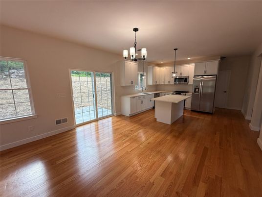 Chandelier, Interior, Kitchen, Pendant Lights, Recessed Lighting, Stainless Steel Appliances, Wood Texture Flooring