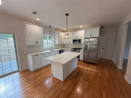 Interior, Kitchen, Pendant Lights, Recessed Lighting, Stainless Steel Appliances, Wood Texture Flooring