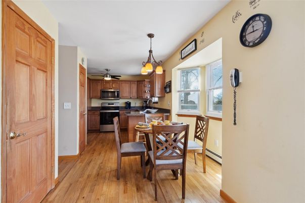 Dining room, Interior, Kitchen, Pendant Lights, Stainless Steel Appliances, Wood Texture Flooring