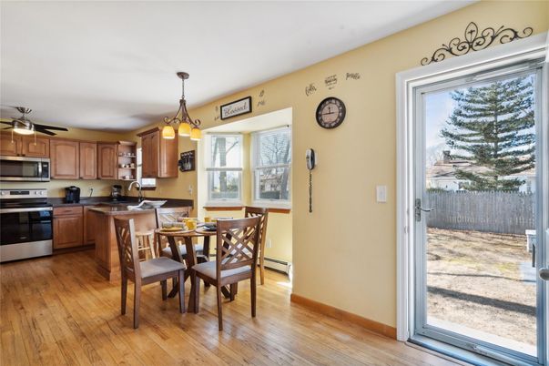 Dining room, Interior, Kitchen, Pendant Lights, Stainless Steel Appliances, Wood Texture Flooring
