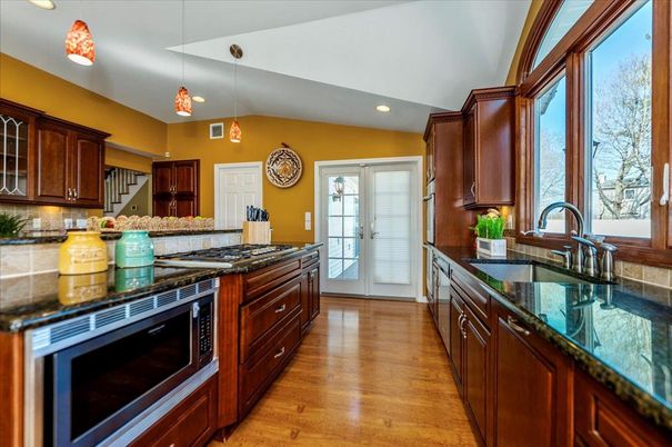 Interior, Kitchen, Pendant Lights, Recessed Lighting, Stainless Steel Appliances, Wood Texture Flooring