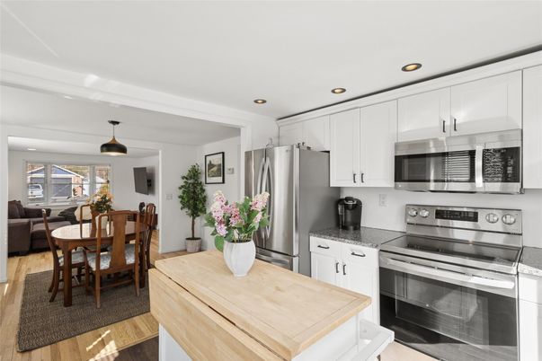 Dining room, Interior, Kitchen, Pendant Lights, Recessed Lighting, Stainless Steel Appliances, Wood Texture Flooring
