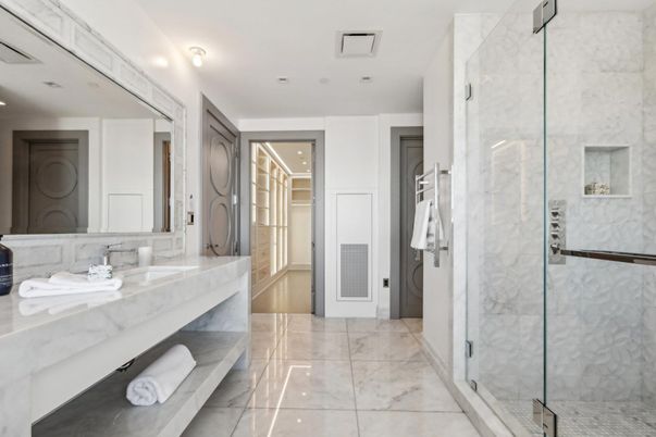 Bathroom, Dual Sink Vanities, Glass Shower, Interior, Marble Walls, Recessed Lighting