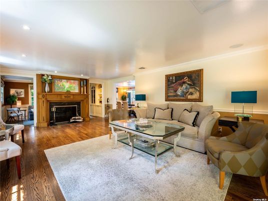 Dining room, Fireplace, Interior, Living room, Recessed Lighting, Wood Texture Flooring