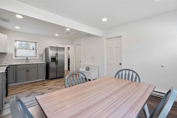 Dining room, Interior, Kitchen, Recessed Lighting, Stainless Steel Appliances, Wood Texture Flooring