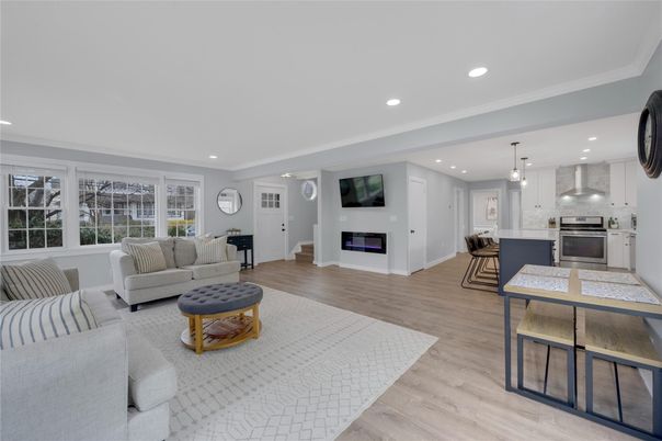 Dining room, Fireplace, Interior, Kitchen, Living room, Pendant Lights, Recessed Lighting, Stainless Steel Appliances, Wood Texture Flooring