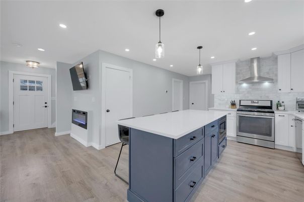 Interior, Kitchen, Pendant Lights, Recessed Lighting, Stainless Steel Appliances, Wood Texture Flooring