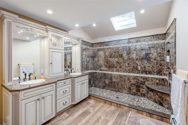 Bathroom, Dual Sink Vanities, Glass Shower, Interior, Recessed Lighting, Wood Texture Flooring
