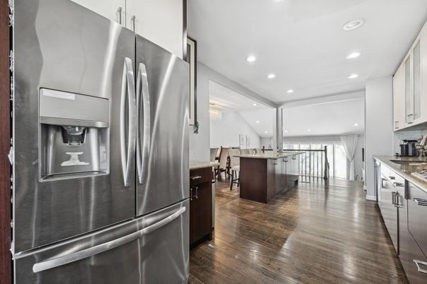 Chandelier, Dining room, Interior, Kitchen, Recessed Lighting, Stainless Steel Appliances, Wood Texture Flooring