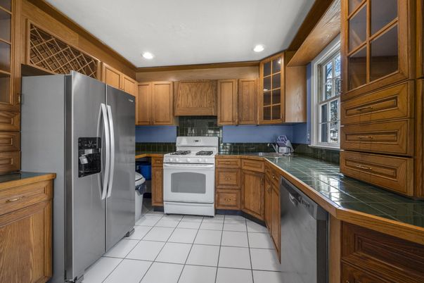 Interior, Kitchen, Recessed Lighting, Stainless Steel Appliances, Tile Countertops