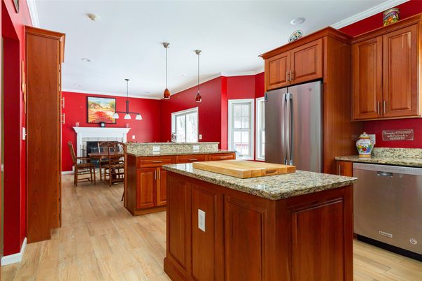Dining room, Fireplace, Interior, Kitchen, Pendant Lights, Recessed Lighting, Stainless Steel Appliances, Wood Texture Flooring