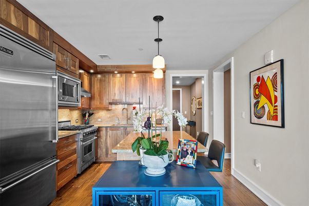Dining room, Interior, Kitchen, Pendant Lights, Recessed Lighting, Stainless Steel Appliances, Wood Texture Flooring