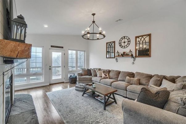 Chandelier, Fireplace, Interior, Living room, Recessed Lighting, Wood Texture Flooring