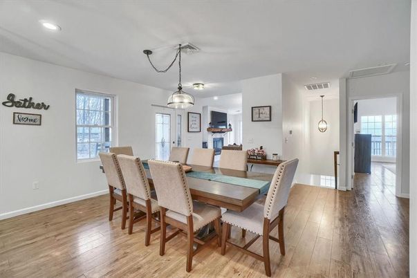 Dining room, Fireplace, Interior, Pendant Lights, Recessed Lighting, Wood Texture Flooring