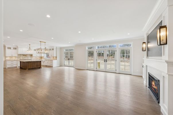 Empty room, Fireplace, Interior, Kitchen, Pendant Lights, Recessed Lighting, Wood Texture Flooring