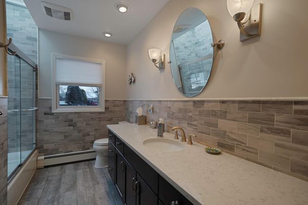 Bathroom, Dual Sink Vanities, Glass Shower, Interior, Recessed Lighting, Wood Texture Flooring