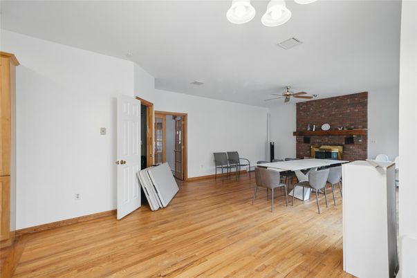 Dining room, Fireplace, Interior, Stone Walls, Wood Texture Flooring