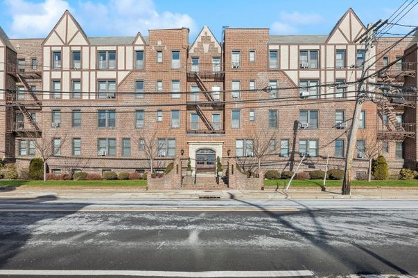 Exterior, Facade, Brick Facade, Condo Building