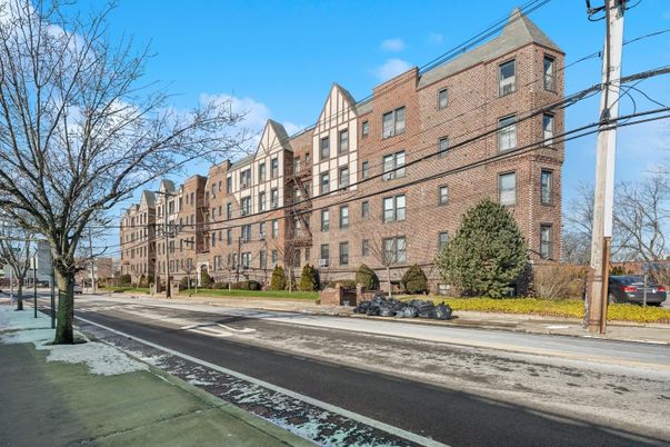 Exterior, Facade, Brick Facade, Condo Building