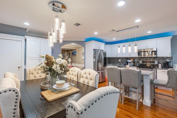 Dining room, Interior, Kitchen, Pendant Lights, Recessed Lighting, Stainless Steel Appliances, Wood Texture Flooring