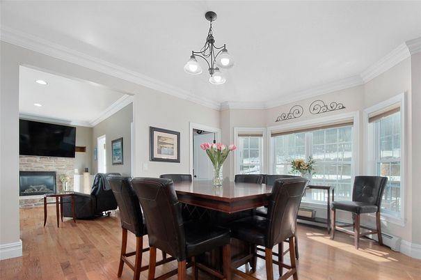 Dining room, Fireplace, Interior, Living room, Pendant Lights, Recessed Lighting, Wood Texture Flooring