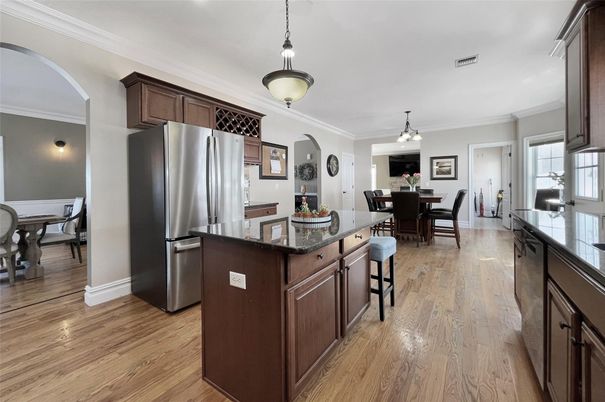 Dining room, Interior, Kitchen, Pendant Lights, Stainless Steel Appliances, Wood Texture Flooring