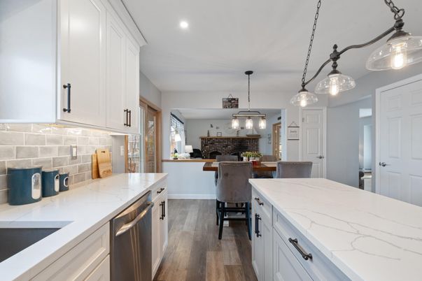 Dining room, Interior, Kitchen, Pendant Lights, Recessed Lighting, Stainless Steel Appliances, Wood Texture Flooring
