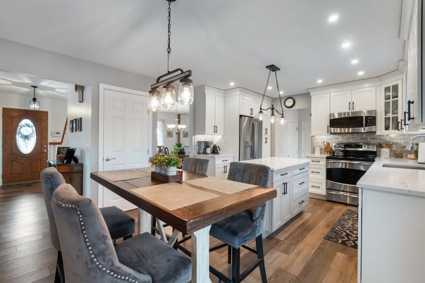Dining room, Interior, Kitchen, Pendant Lights, Recessed Lighting, Stainless Steel Appliances, Wood Texture Flooring