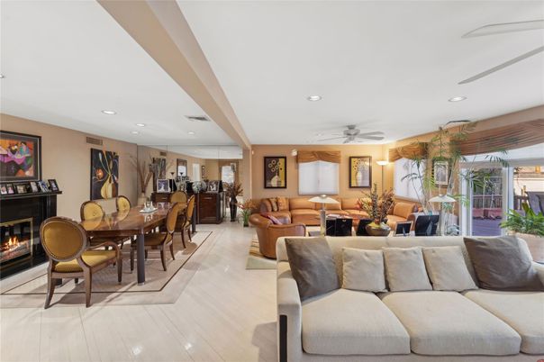 Dining room, Fireplace, Interior, Living room, Recessed Lighting, Wood Texture Flooring
