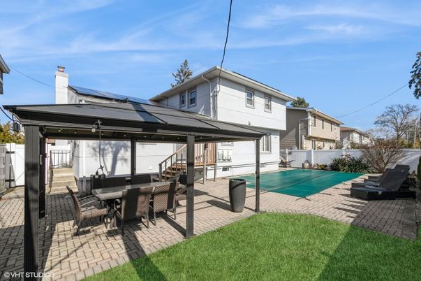 Exterior, Pool, Solar Panels