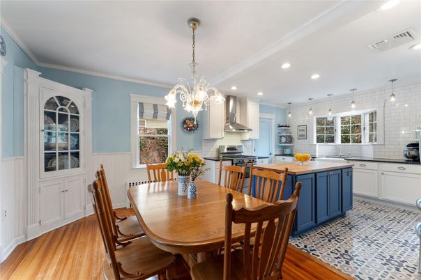 Chandelier, Dining room, Interior, Kitchen, Pendant Lights, Recessed Lighting, Stainless Steel Appliances, Wood Texture Flooring