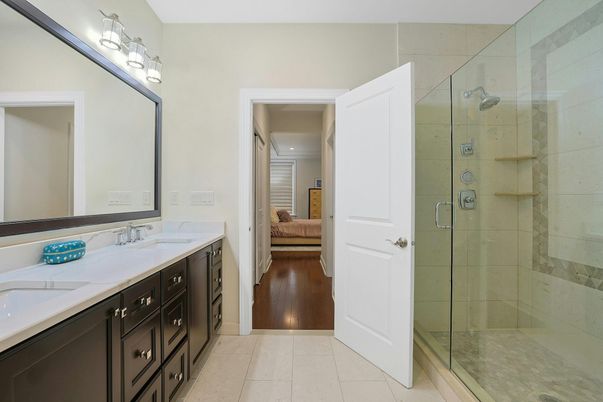 Bathroom, Dual Sink Vanities, Glass Shower, Interior, Wood Texture Flooring