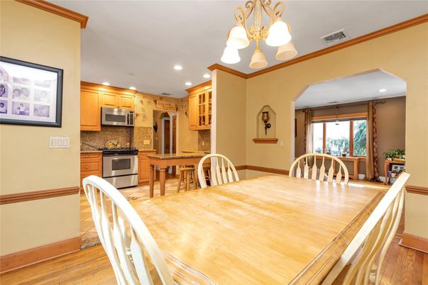 Dining room, Interior, Kitchen, Recessed Lighting, Stainless Steel Appliances, Wood Texture Flooring