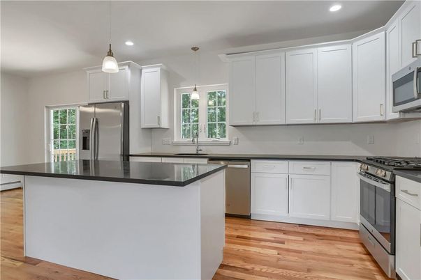 Interior, Kitchen, Pendant Lights, Recessed Lighting, Stainless Steel Appliances, Wood Texture Flooring