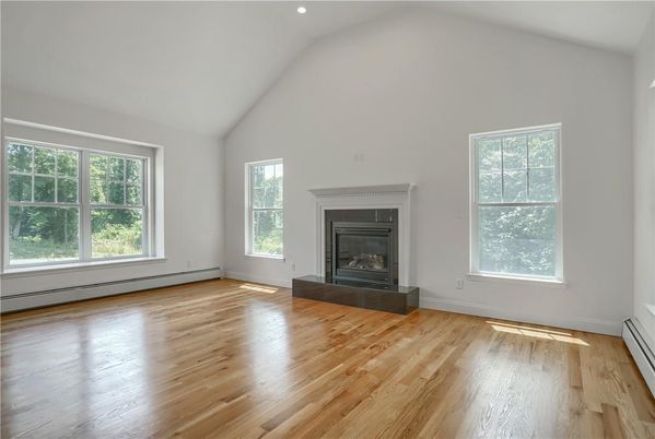 Empty room, Fireplace, Interior, Recessed Lighting, Wood Texture Flooring