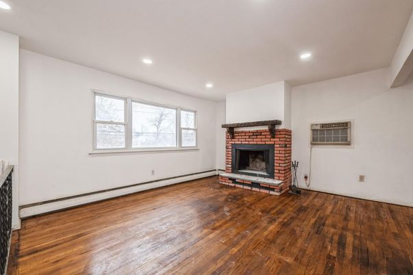 Empty room, Fireplace, Interior, Recessed Lighting, Wood Texture Flooring
