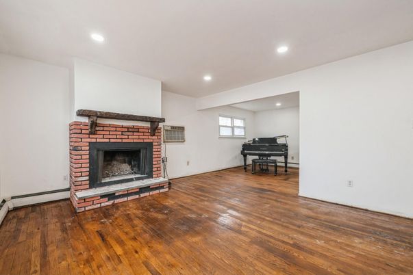 Fireplace, Interior, Piano, Recessed Lighting, Wood Texture Flooring