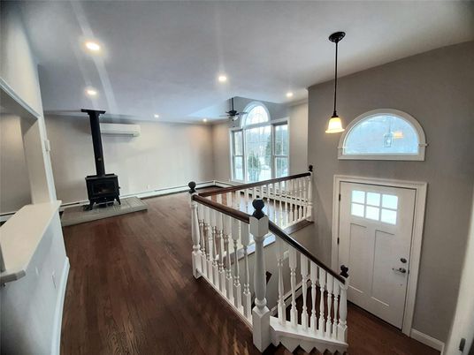 Fireplace, Interior, Pendant Lights, Recessed Lighting, Wood Texture Flooring