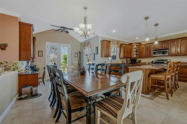 Chandelier, Dining room, Interior, Kitchen, Pendant Lights, Recessed Lighting, Stainless Steel Appliances