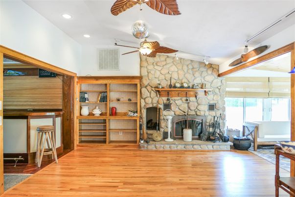 Fireplace, Interior, Recessed Lighting, Stone Walls, Wood Texture Flooring