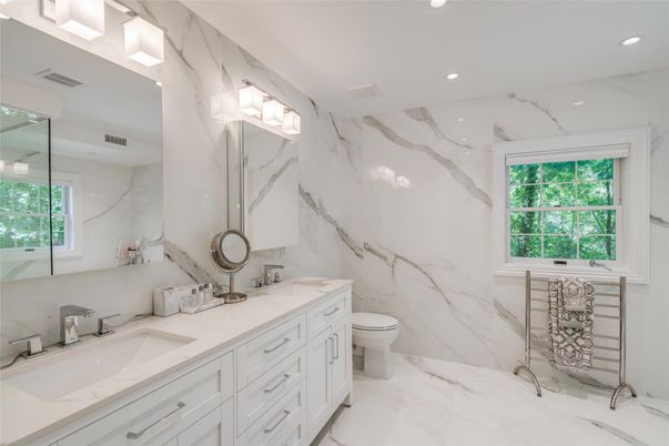 Bathroom, Dual Sink Vanities, Glass Shower, Interior, Marble, Marble Walls, Recessed Lighting