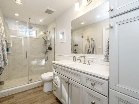 Bathroom, Glass Shower, Interior, Marble Walls, Recessed Lighting, Wood Texture Flooring