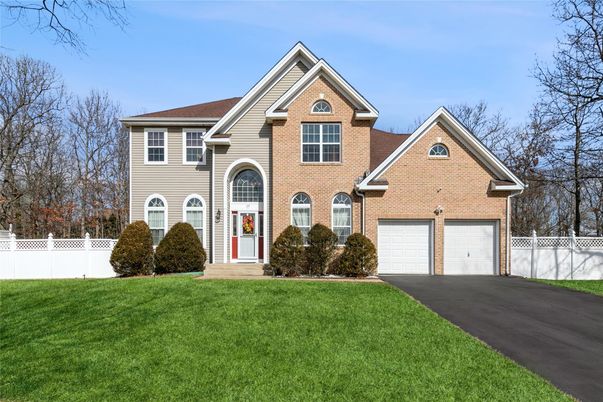 Attached, Exterior, Facade, Brick Facade, Brick Traditional