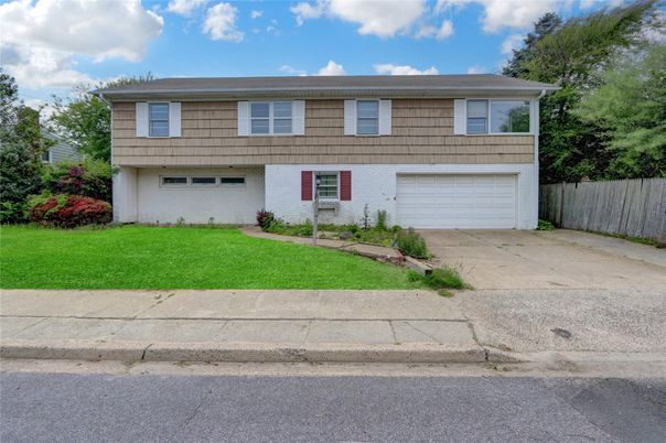 Attached, Exterior, Facade, Raised Ranch