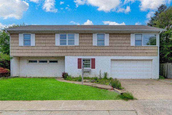 Attached, Exterior, Facade, Raised Ranch