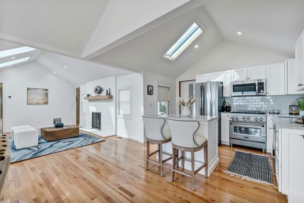 Fireplace, Interior, Kitchen, Recessed Lighting, Stainless Steel Appliances, Wood Texture Flooring