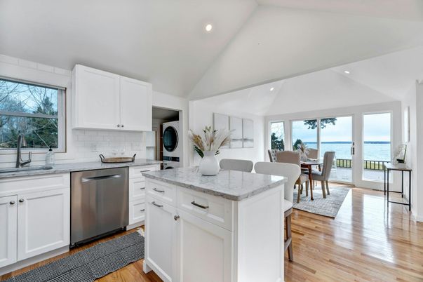 Dining room, Interior, Kitchen, Recessed Lighting, Stainless Steel Appliances, Water, Wood Texture Flooring